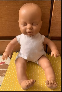 Andy B.'s doll after treatment