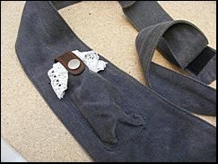 Black shoulder bag (detail)